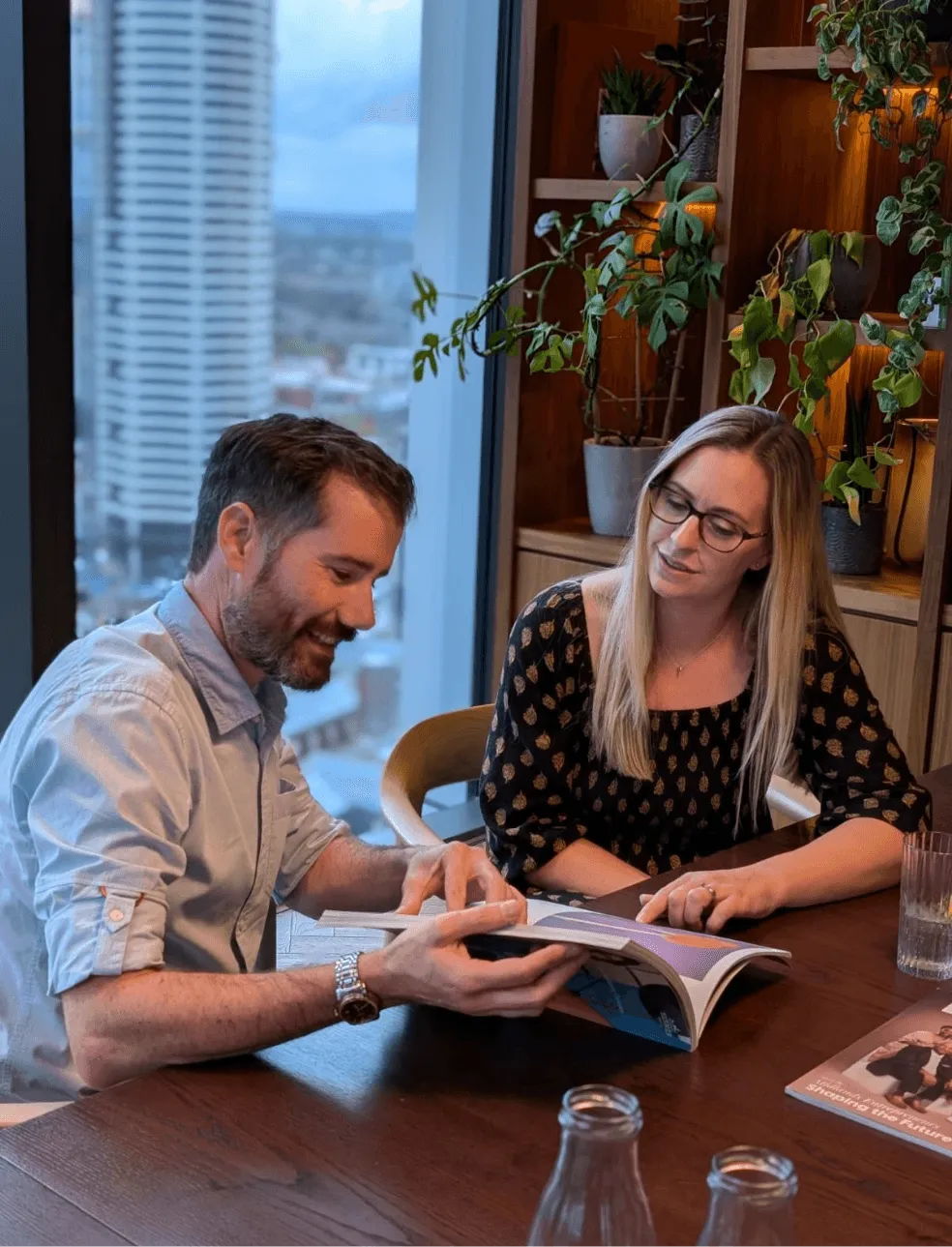 Sam and Siobhan discussing a web design project in a meeting